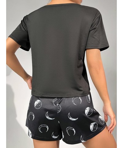 Women's Cute Graphic Print Short Sleeve Crop Top With Shorts Pajama Set Moon Black $12.60 Sleep & Lounge